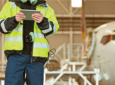 Health and safety employee in high vis jacket