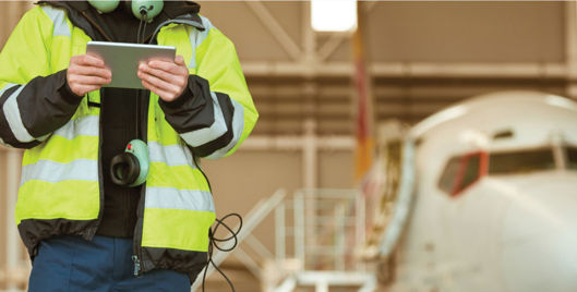 Health and safety employee in high vis jacket