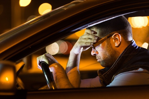 Man Car Headache Tired Night Driving MED Istock Credit Valentinrussanov