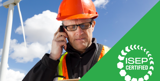 Man wearing a hard hat on the phone