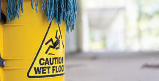 Yellow caution wet floor sign